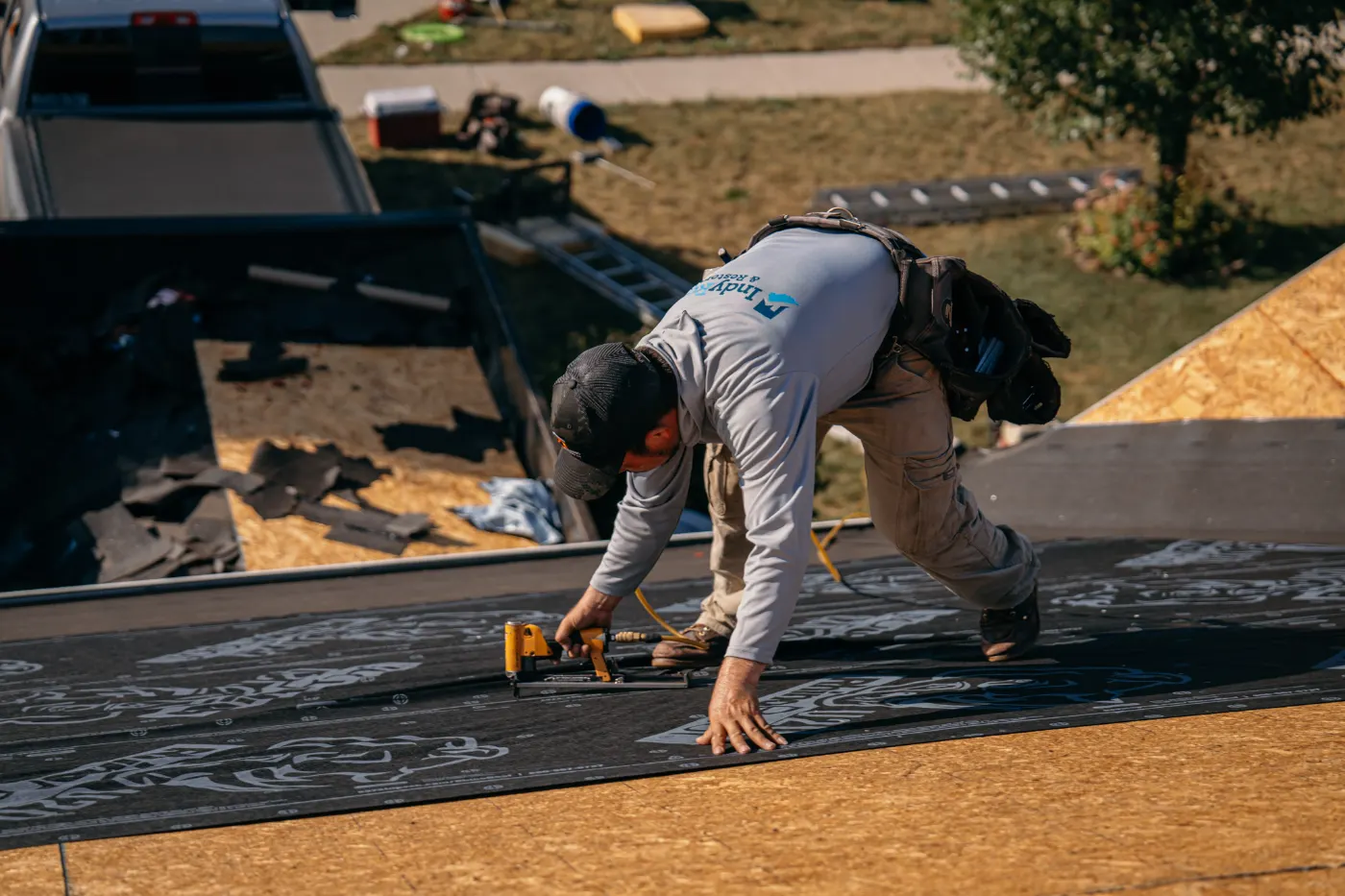 Tarping and dry-in on a Williams Glen commercial roof